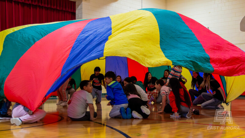 The EAHS Students developed and implemented a variety of engaging lessons using a parachute to promote physical activity, teamwork, and motor skills among elementary students. These lessons are designed to be fun and educational, encouraging students to participate actively and work together.